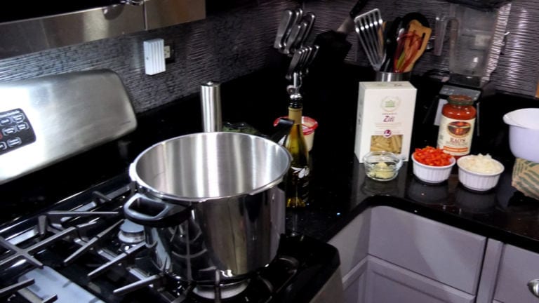 Pressure cooker and ingredients for baked ziti.